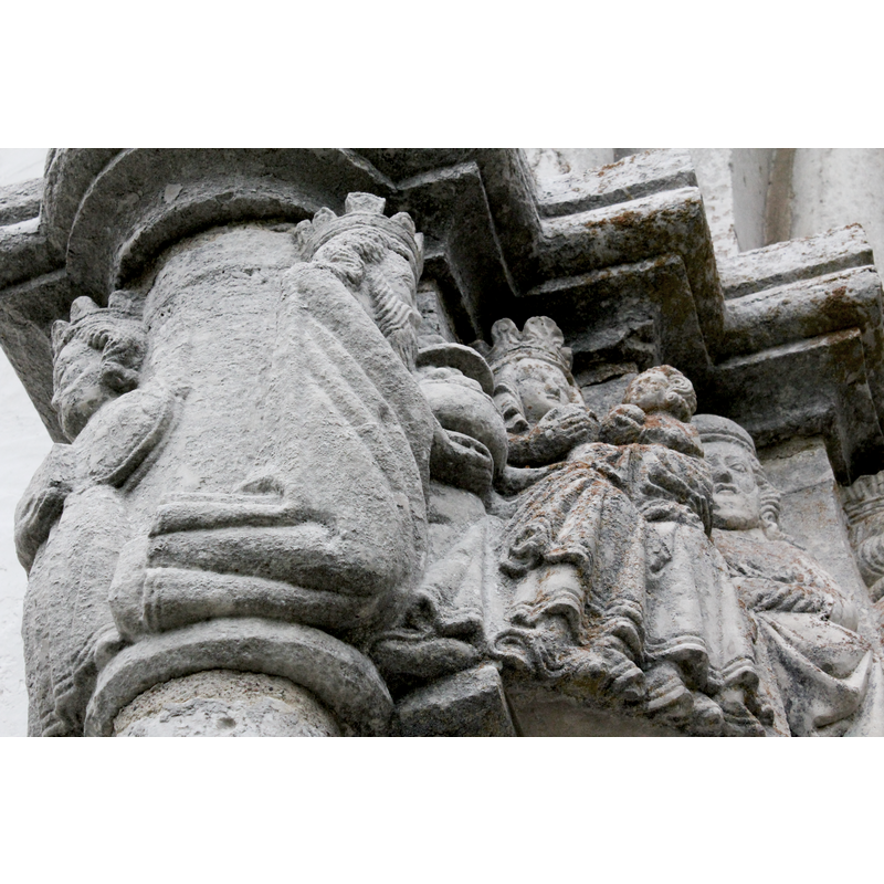 partial view of the Adoration of the Magi scene: two Magi carrying gifts, the crowned and seated Madonna with Child on her lap and Joseph at the far right