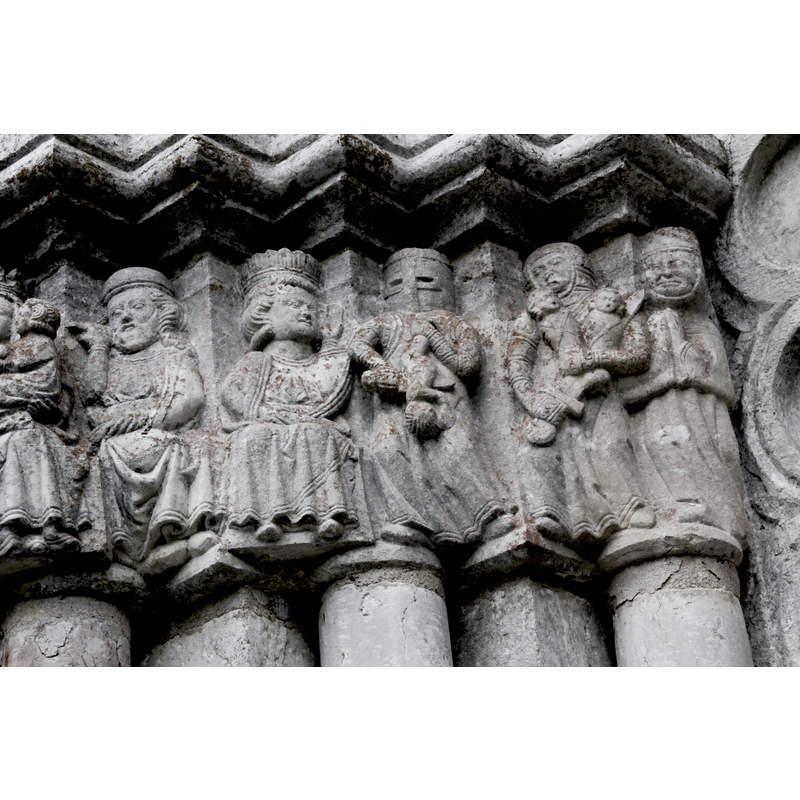 On the left is Joseph as part of the Adoration of the Magi. The scene on the right is the Massacre of the Innocent: crwoned seated Herod gives the orders that are executed by two very medieval-looking soldiers; at the far right a grieving mother.