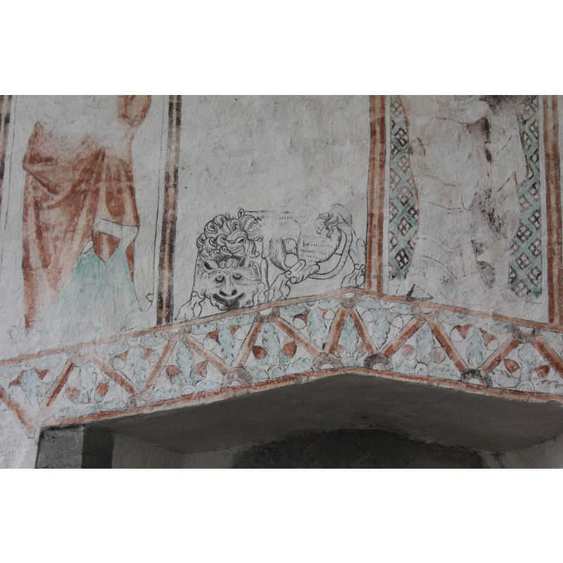 detail of the painting over the doorway just east of the chancel arch