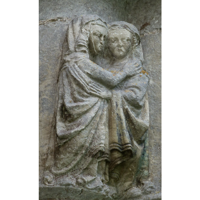 Visitation: the two women embrace but do not look at each other, their unsmiling gaze 2/3 towards the viewer