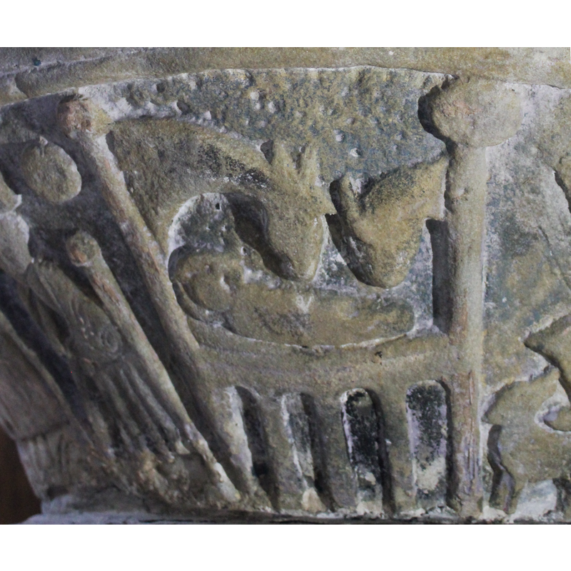 Lying in a poster, architectonic type of manger, the Child is swaddled. The heads of the two animals watch over him.Lying in a poster, architectonic type of manger, the Child is swaddled. The heads of the two animals watch over him.