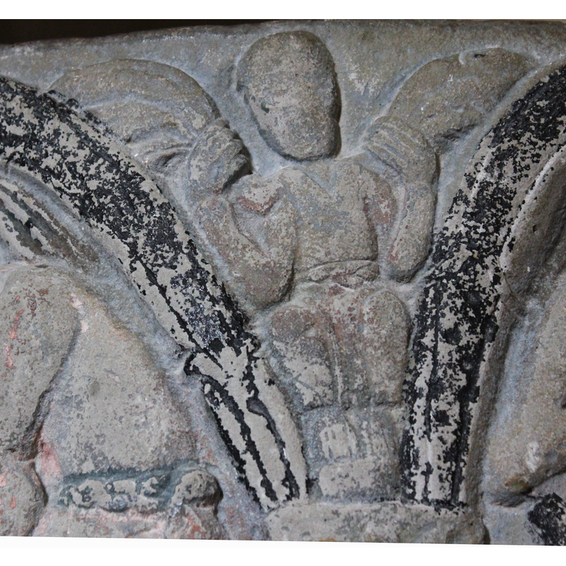 located between the arches containing the Creation of Eve (left) and the Creation of Adam (right)