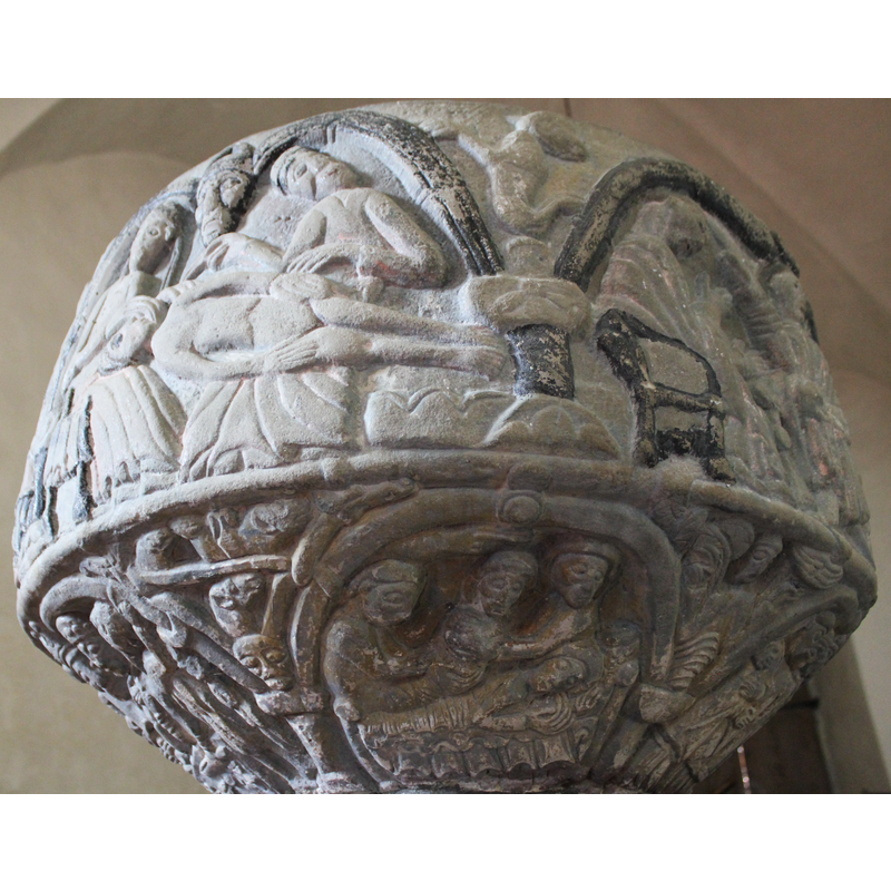 some of the arch-heads decorated with circles (?)
