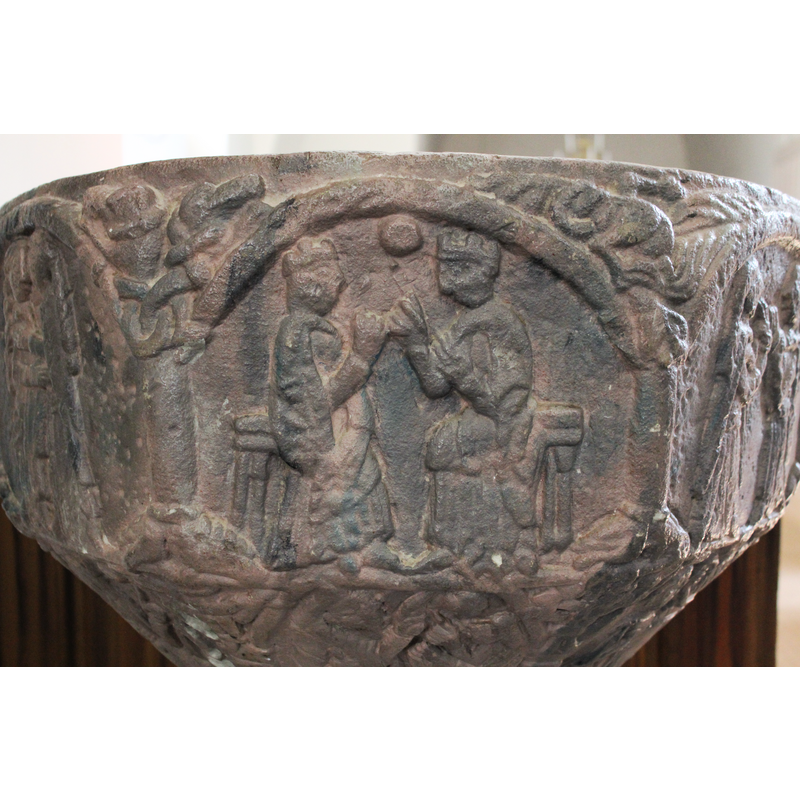 on the east side of the basin [orientation is approximate] -- Two figures sit on thrones, both are corwned. Christ and the Virgin in heaven.