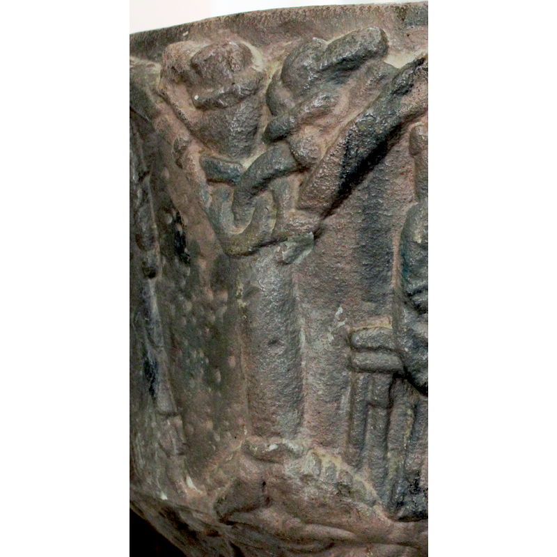 in the spandrel to the right of scene 8 --it appears to have a large head to the left, then a long knotted body that goes upwards on the right