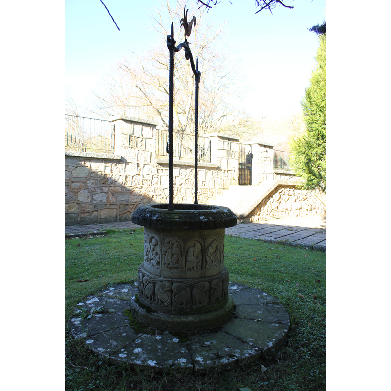 monastery extramural gardens: well-head with replica sculptures (Labours of the Month?); detail