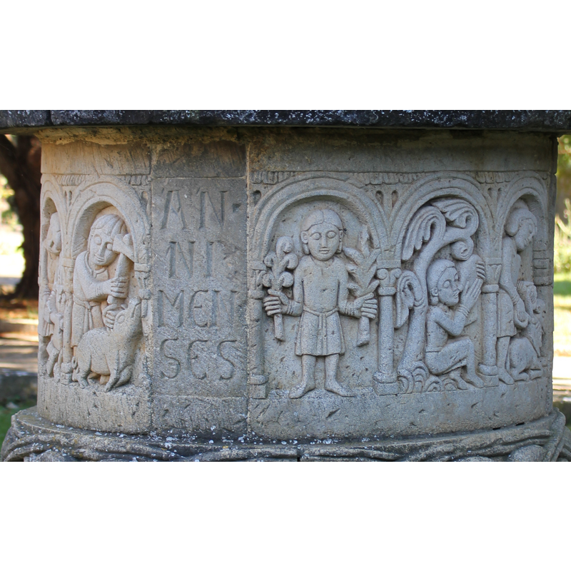 monastery extramural gardens: well-head with replica sculptures (Labours of the Month?); detail