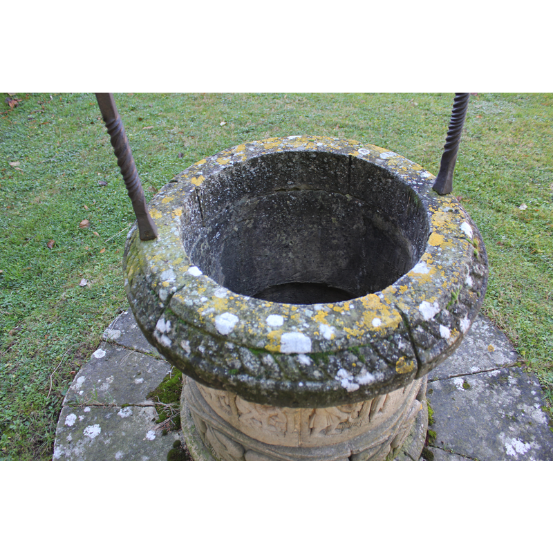 monastery extramural gardens: well-head with replica sculptures (Labours of the Month?); detail