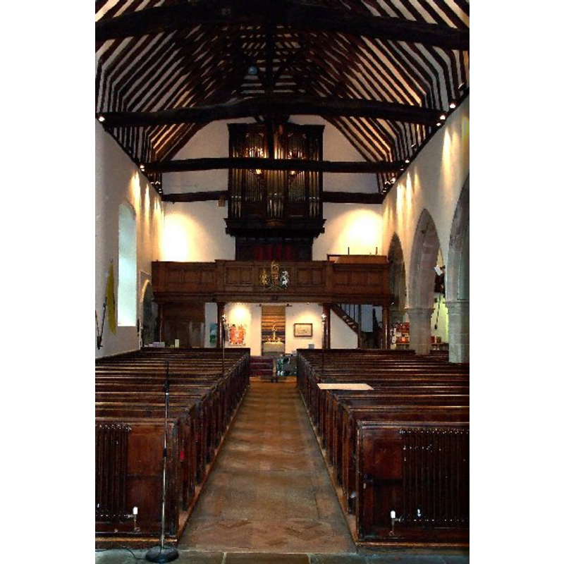 the font in the centre aisle, far end