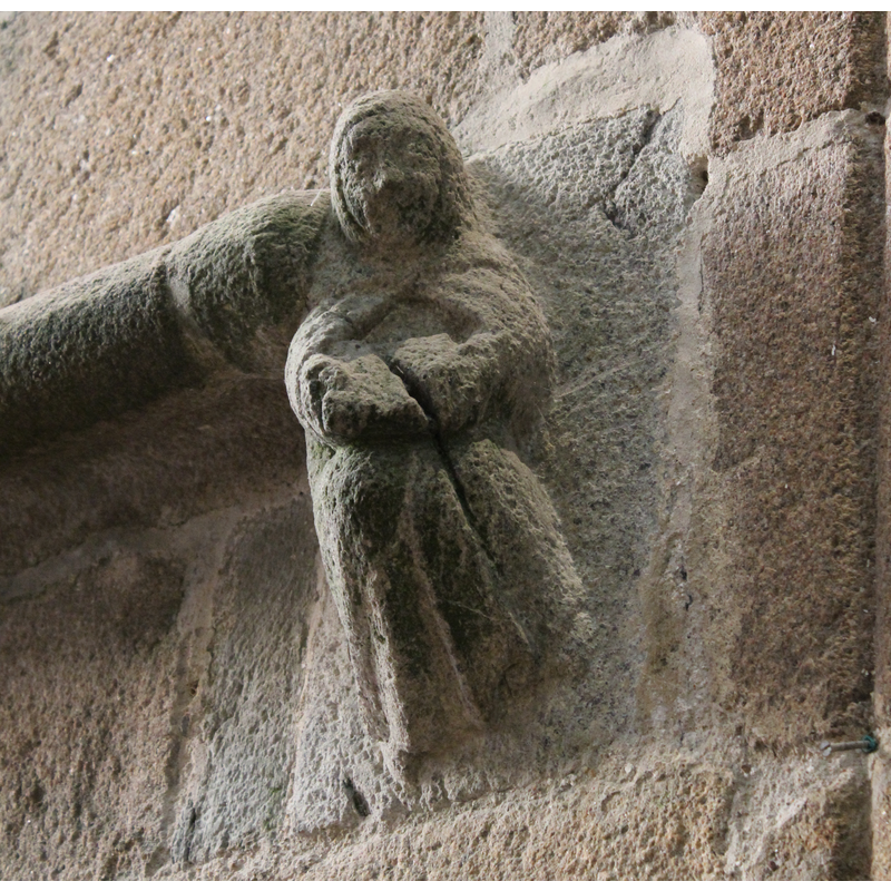 on the wall opposite the baptistery