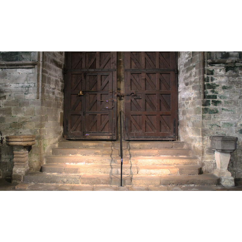 showing the two stoups left and and right of the entranceway