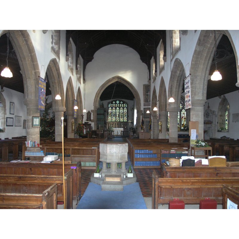 with the font towards the west end, centre aisle