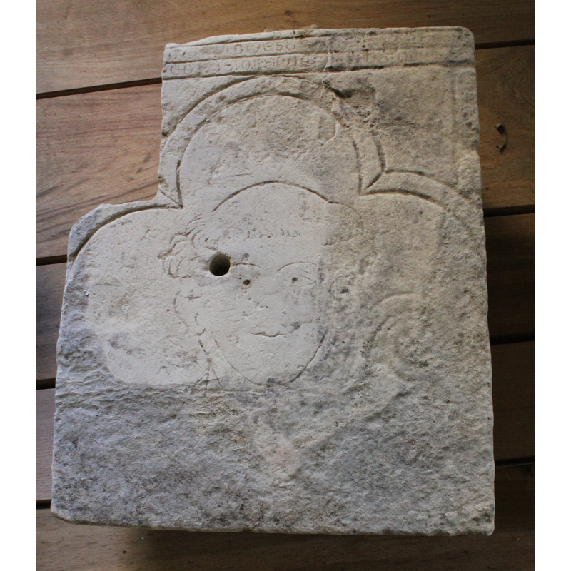 sculptural remain now kept in a room of the former abbey, used as lapidarium