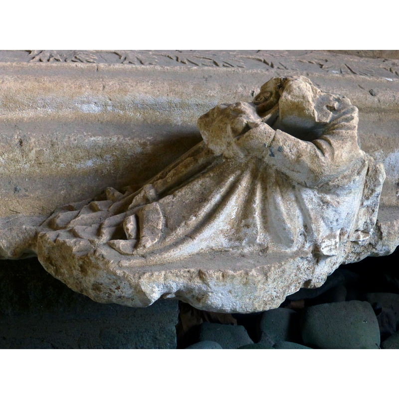 one of the two seated figures; note the abbatial baculum