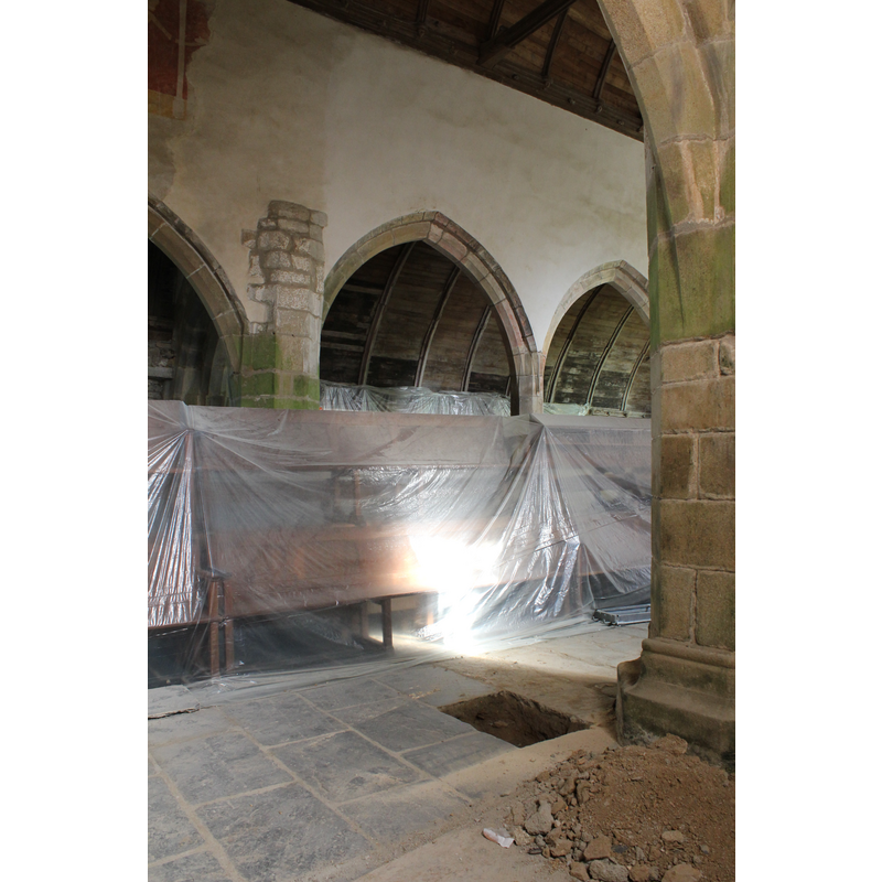 located by the door that opens to the exterior in the west wall of this southeast section