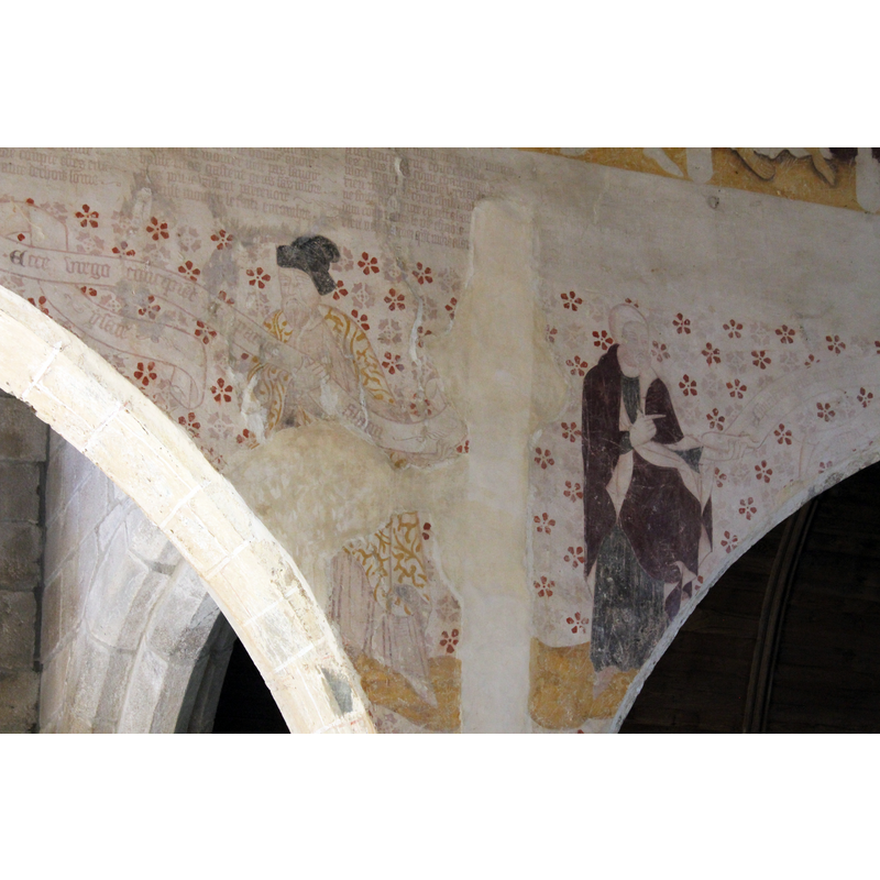 in the spandrels below the Danse macabre