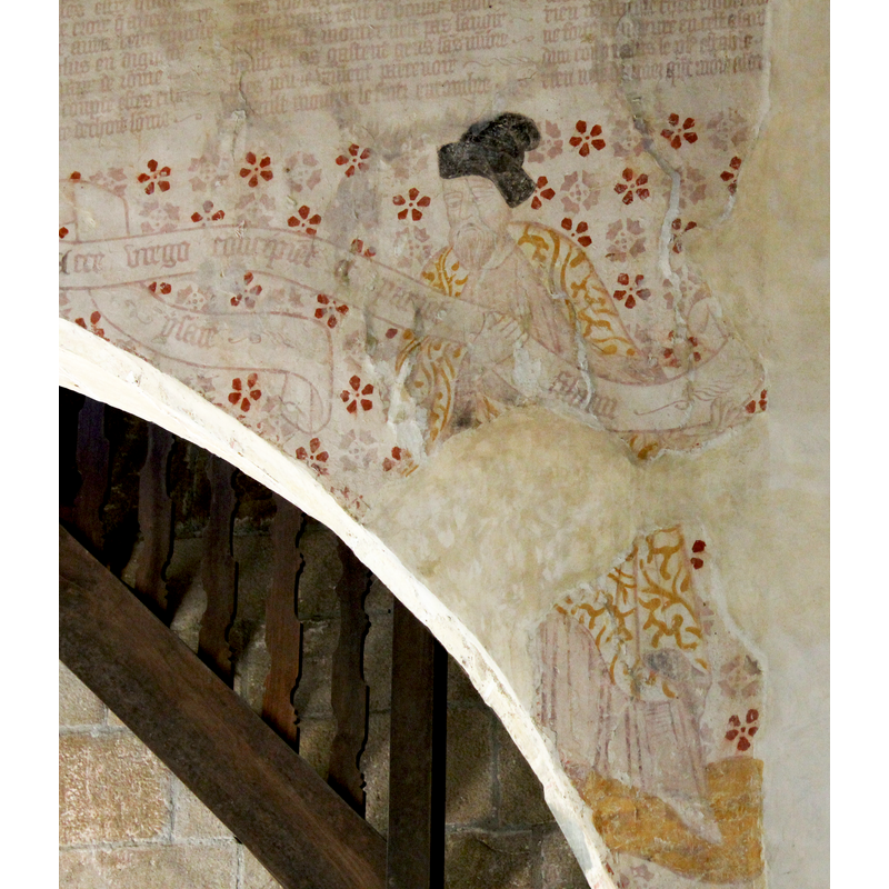 in the spandrels below the Danse macabre