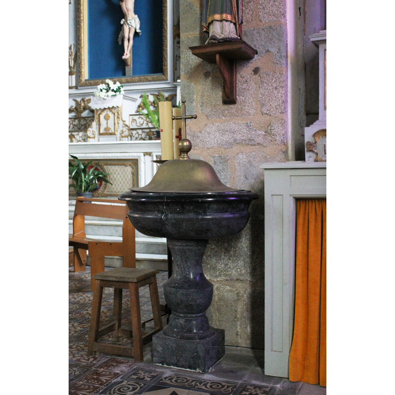 the modern font located at the northeast corner of the chancel