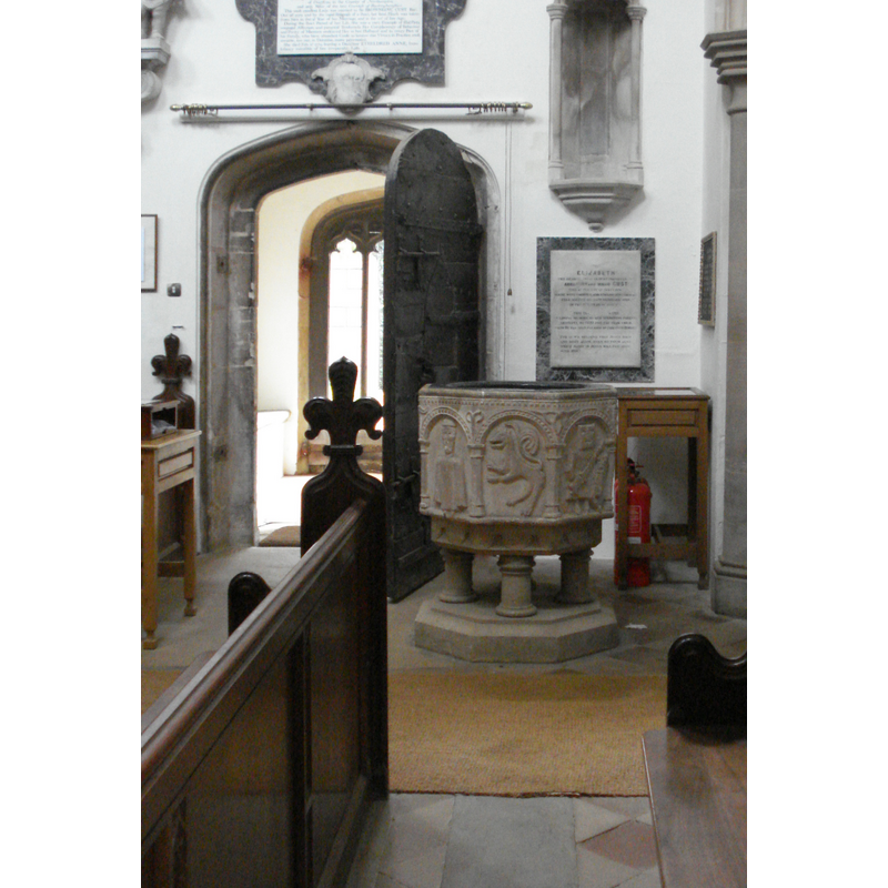 at the west end of the nave, opposite the south doorway