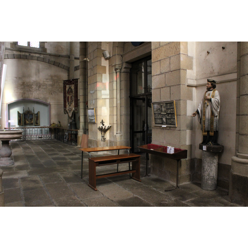 the large font or stoup seen here in the context of the west end of the nave