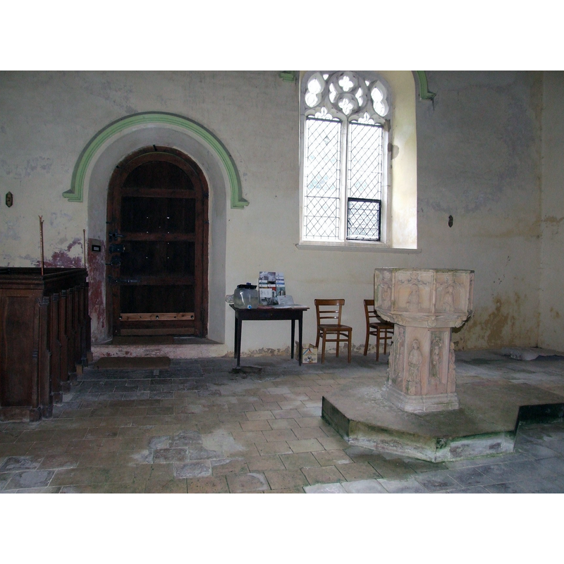 at the west end of the nave; at the back the south doorway