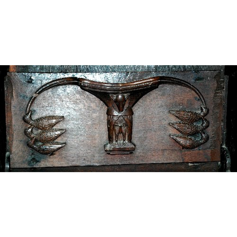 one of the misericords in this church: a fox-like priest preaches to six geese