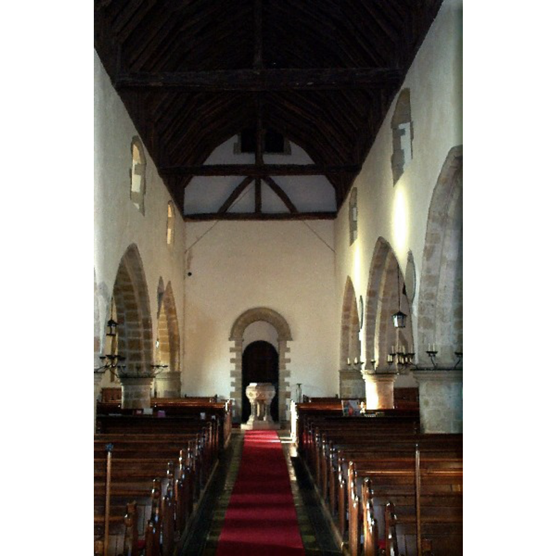 the modern font at the back (west), centre aisle