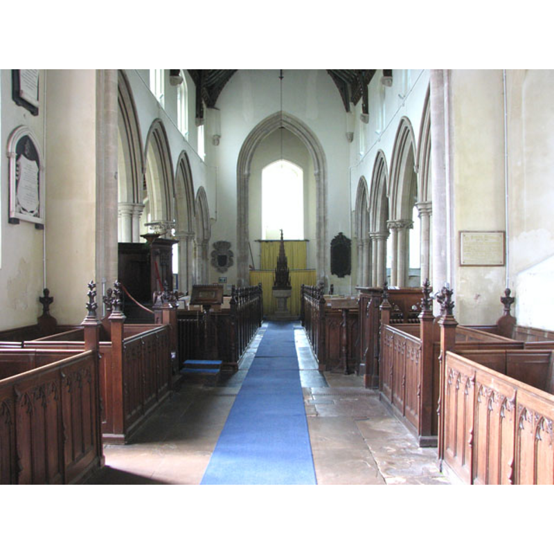 the 19th-century font and cover at the west end, centre aisle