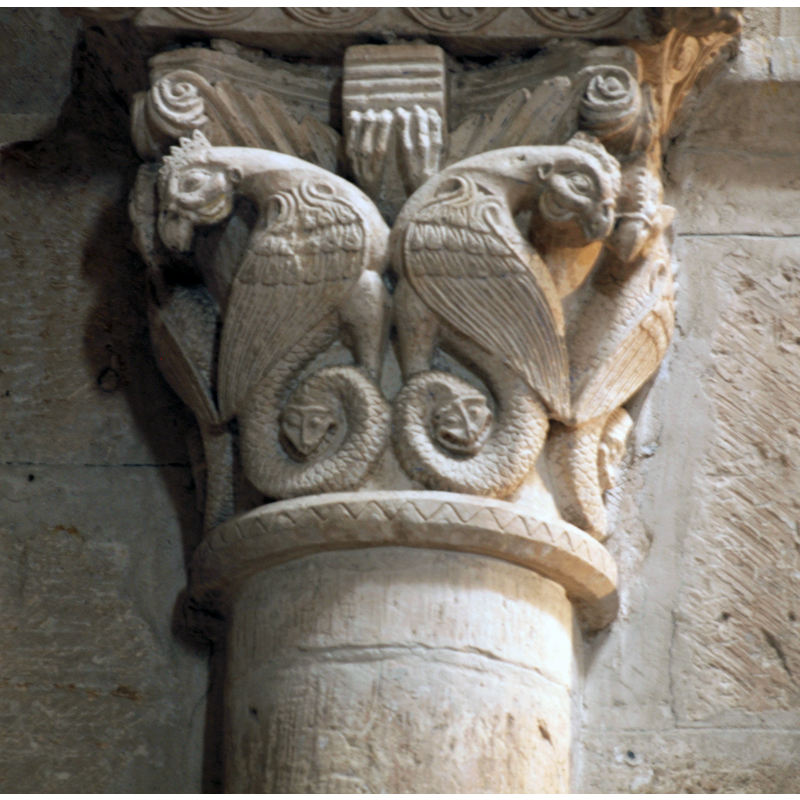 two pairs of winged beasts confronted; the beasts appear to be amphisbaenas, the second head clearly visible at the end of the tail