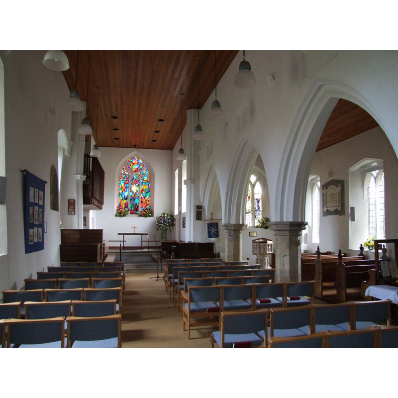 the font is visible through the arcade, at the east end of the north aisle