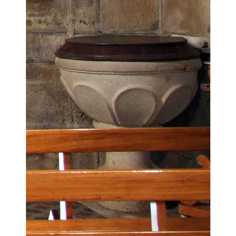 the modern font located in the northwest corner of the nave