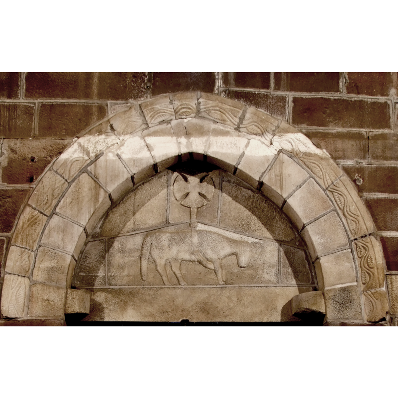the interior tympanum on the west doorway
