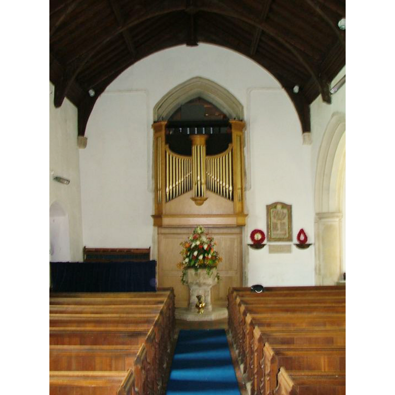 the font visible at the west end, centre aisle, by the organ