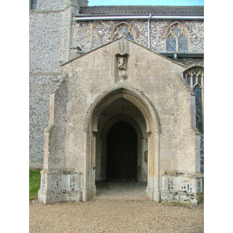 the two Ms on the lower sides of the porch exterior [cf. FontNotes]