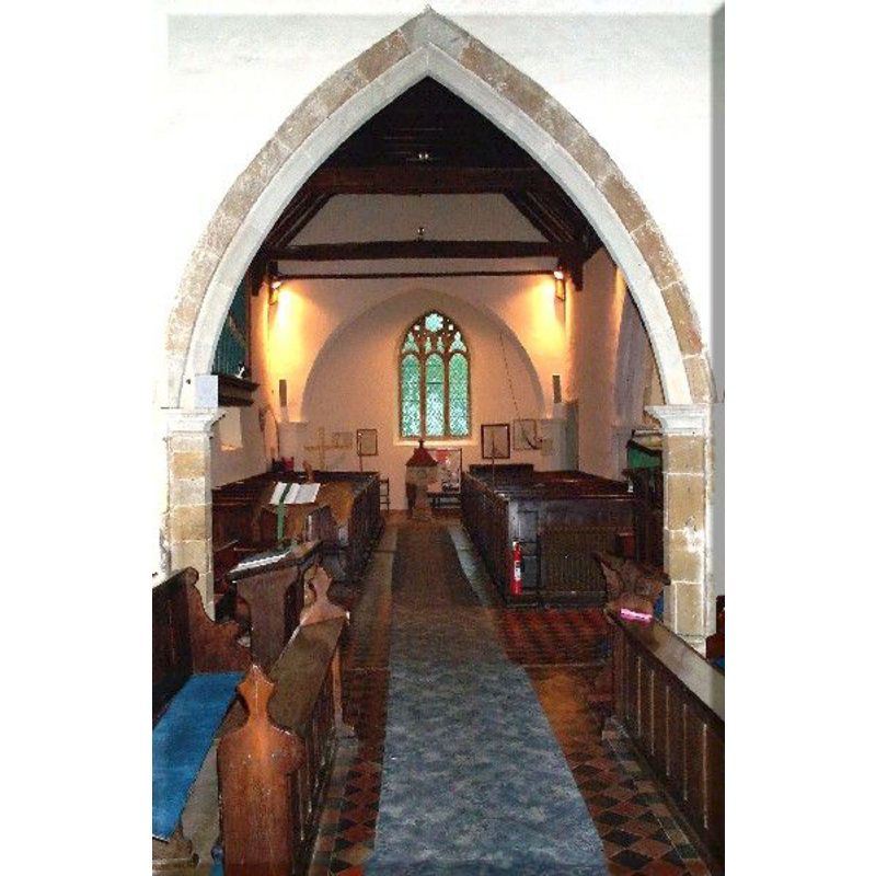 the modern font and cover visible at the west end, centre aisle
