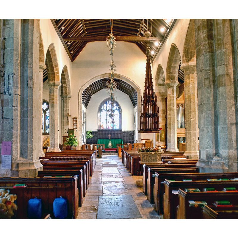 the modern font and cover in the context of the nave; looking east towards the altar