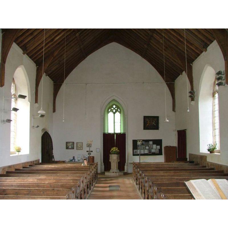 the font and cover visible at the west end, centre aisle