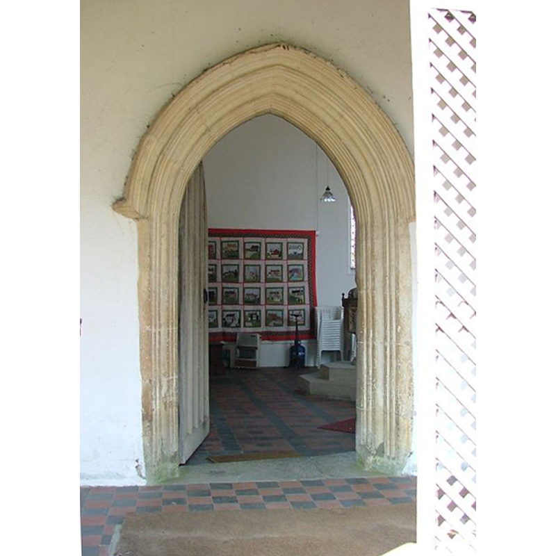 the font and cover are partly visible inside, to the right of the entrance