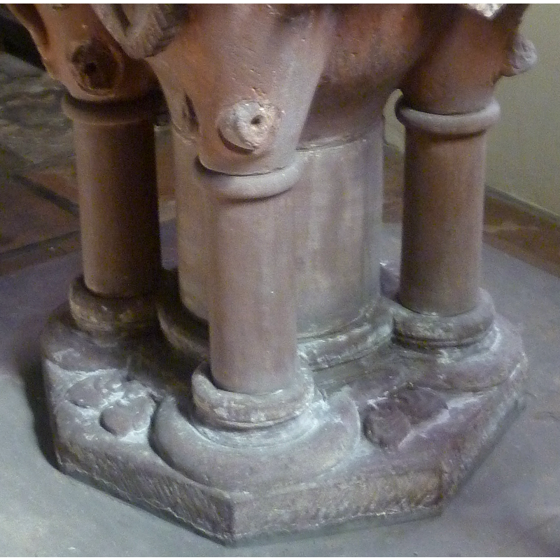 forming the capitals and bases of the columns of the base -- the columns themselves could be modern replacements