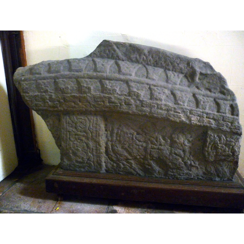 now kept inside the church, near the font
