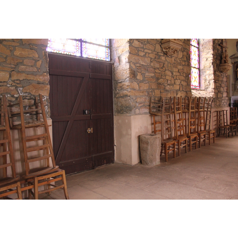 standing by one of the north doors, towards the east side