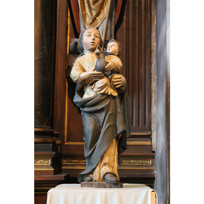 at the east end of the north aisle, to the right of the altar dedicated to Our Lady of Beauport