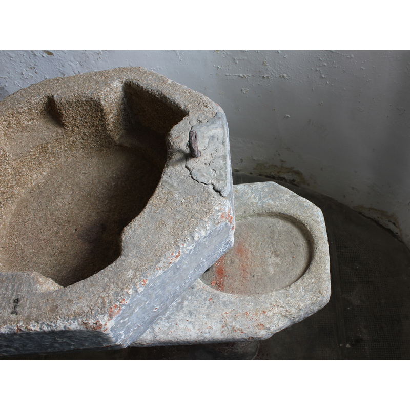 the two basins [NB: the drain in the secondary basin is hidden by the projection of the main basin above