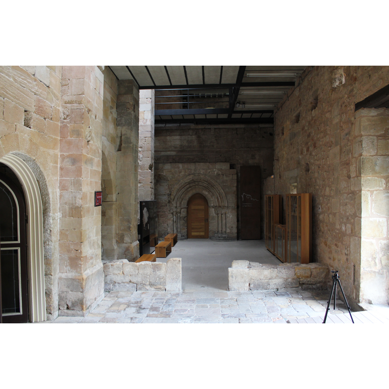 image shows the entrance to the monastery area: the portal in the background opens into the church; on the left side are the doors leading into the monastery dependencies, chapter house, clositer, etc.
