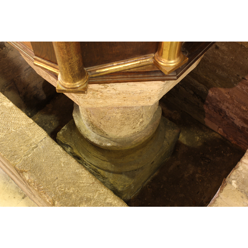 seen here inside the parapet that hides the lower part of the font