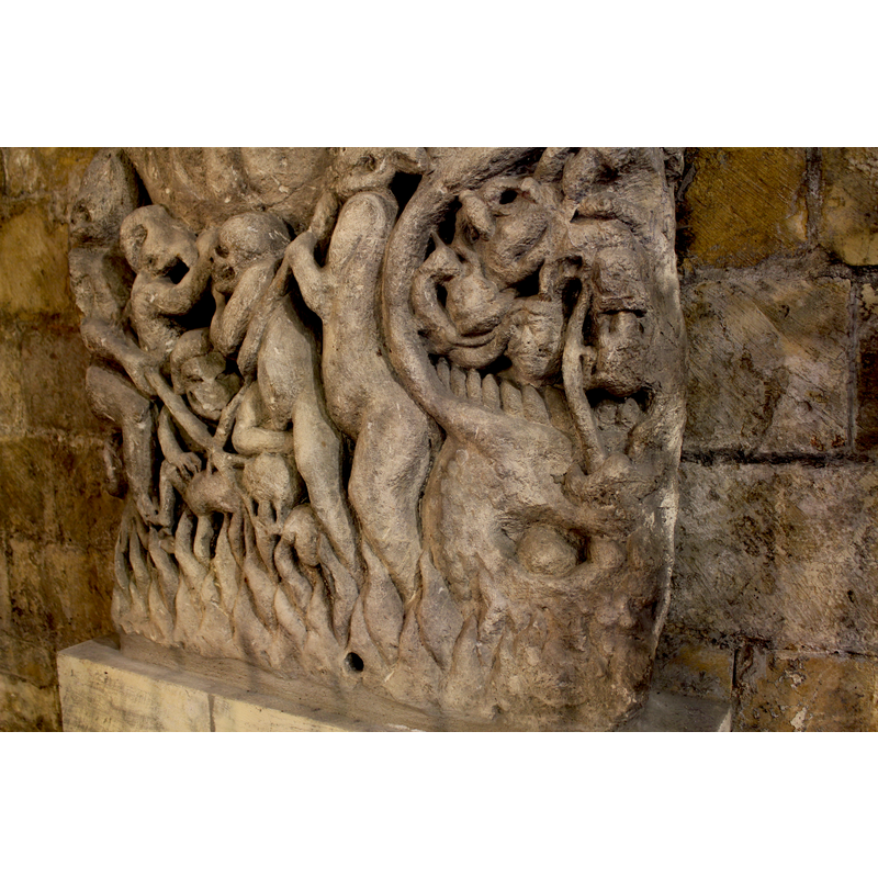 the 'Doomstone' in the crypt: said to be from the Norman building here