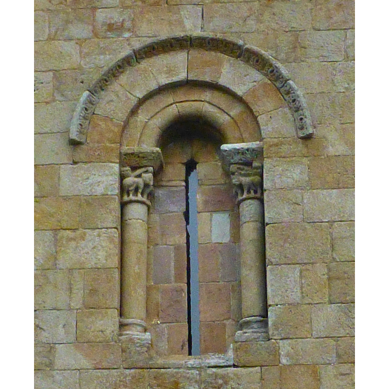 above and to the west of the south portal