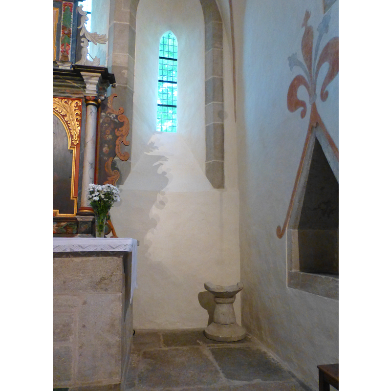 the remains of the 13th-century font