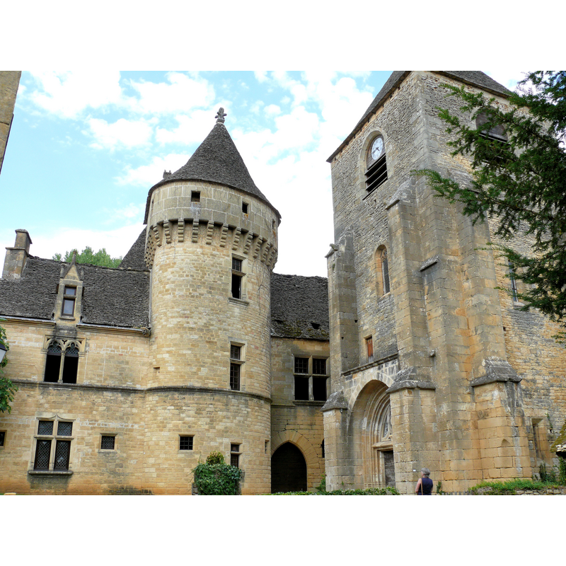 the tower of the church and the castle cheek by jowl