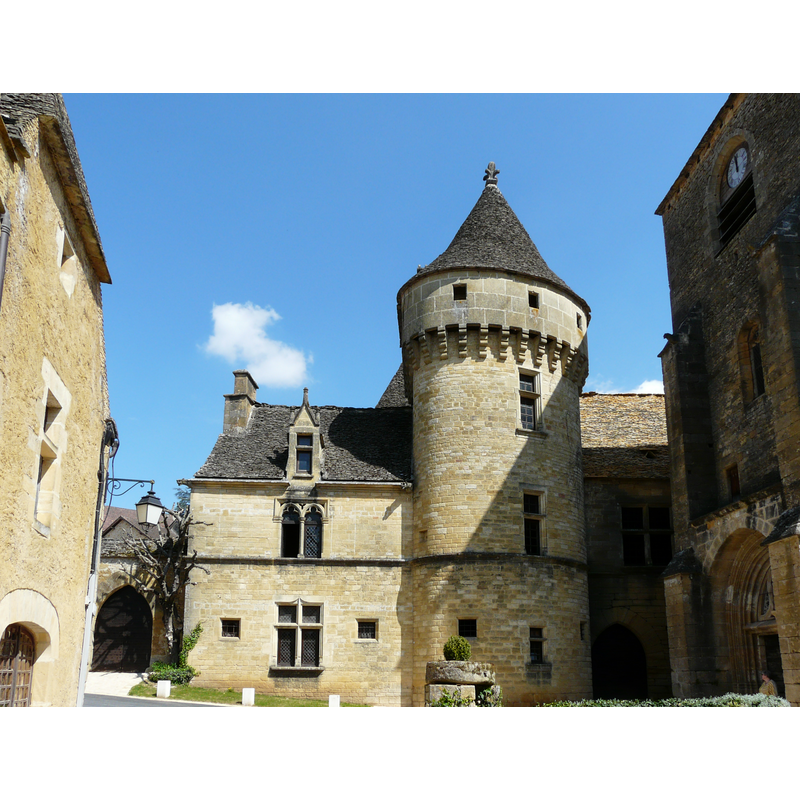 the tower of the church and the castle cheek by jowl